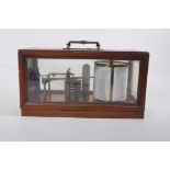 An early C20th Negretti and Zambra mahogany cased barograph, the hinged glazed top, AF, in need of