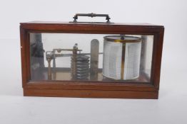 An early C20th Negretti and Zambra mahogany cased barograph, the hinged glazed top, AF, in need of