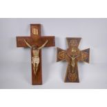 A pokerwork crucifix with brass Christ, and another with a painted composition Christ, largest