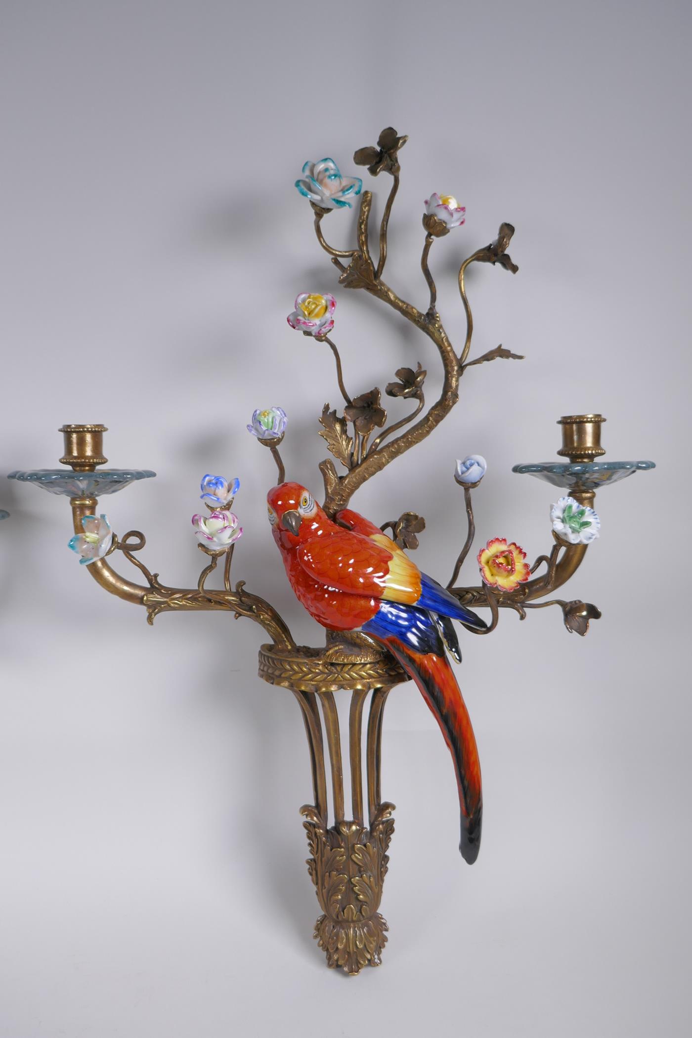 A pair of polychrome porcelain and gilt metal two branch parrot wall sconces with decorative - Image 2 of 4