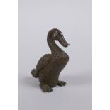 A Japanese style bronze okimono duck, mark to base, 5cm high