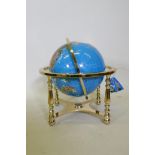 A gemstone terrestialÿ globe in brass mount