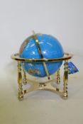 A gemstone terrestialÿ globe in brass mount