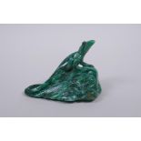 A Chinese marbled green hardstone carving of a lizard on a rock, 9cm long
