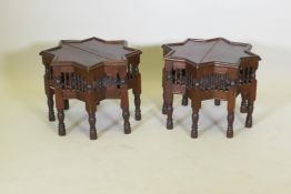 A pair of Moorish hardwood star shaped occasional tables with turned supports, 48cm diameter, 37cm