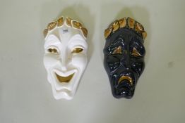 A pair of mid century porcelain wall masks, tragedy and comedy, impressed verso, Jamar Mallory and