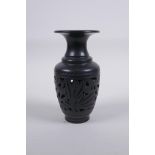 A Chinese black ground YiXing reticulated vase, impressed marks to base, 15cm high