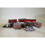 A scratch built train set, rolling stock and carriages with battery illumination and sound, carriage