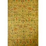 An antique Indian silk embroidered throw, decorated with elephants, camels, flowers, figures and