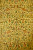 An antique Indian silk embroidered throw, decorated with elephants, camels, flowers, figures and