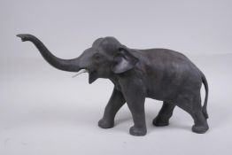 An Austrian style cold painted bronze figure of an elephant, 36cm long, 21cm high
