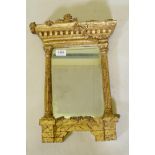 A vintage carved giltwood pier glass in the form of a portico, with bevelled glass, 46 x 28cm