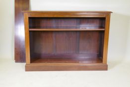 An Anglo-Indian rosewood open bookcase with brass inlaid decoration and two adjustable shelves,