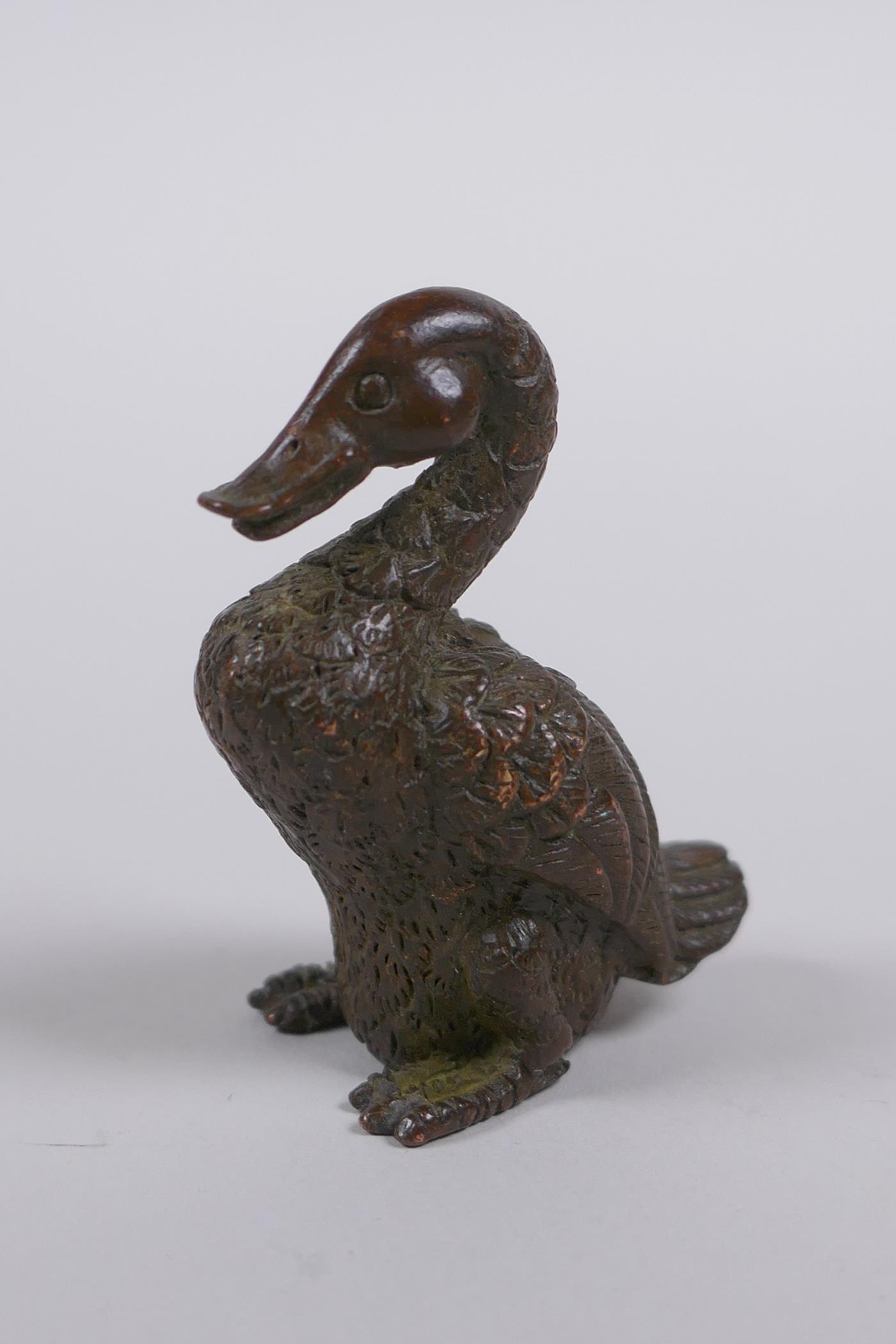A Japanese style bronze okimono duck, mark to base, 5cm high - Image 2 of 3