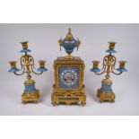 A late C19th/early C20th French ormolu and Sevres style porcelain clock garniture, the hand