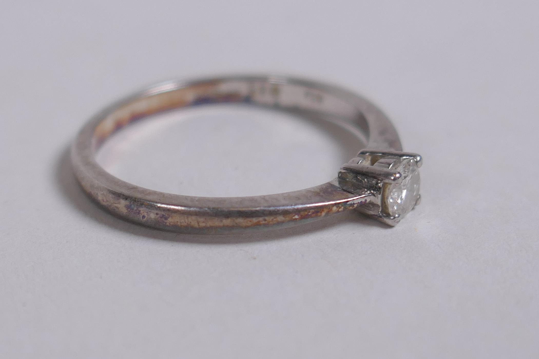 A platinum and diamond solitaire ring, size N approx - Image 2 of 4