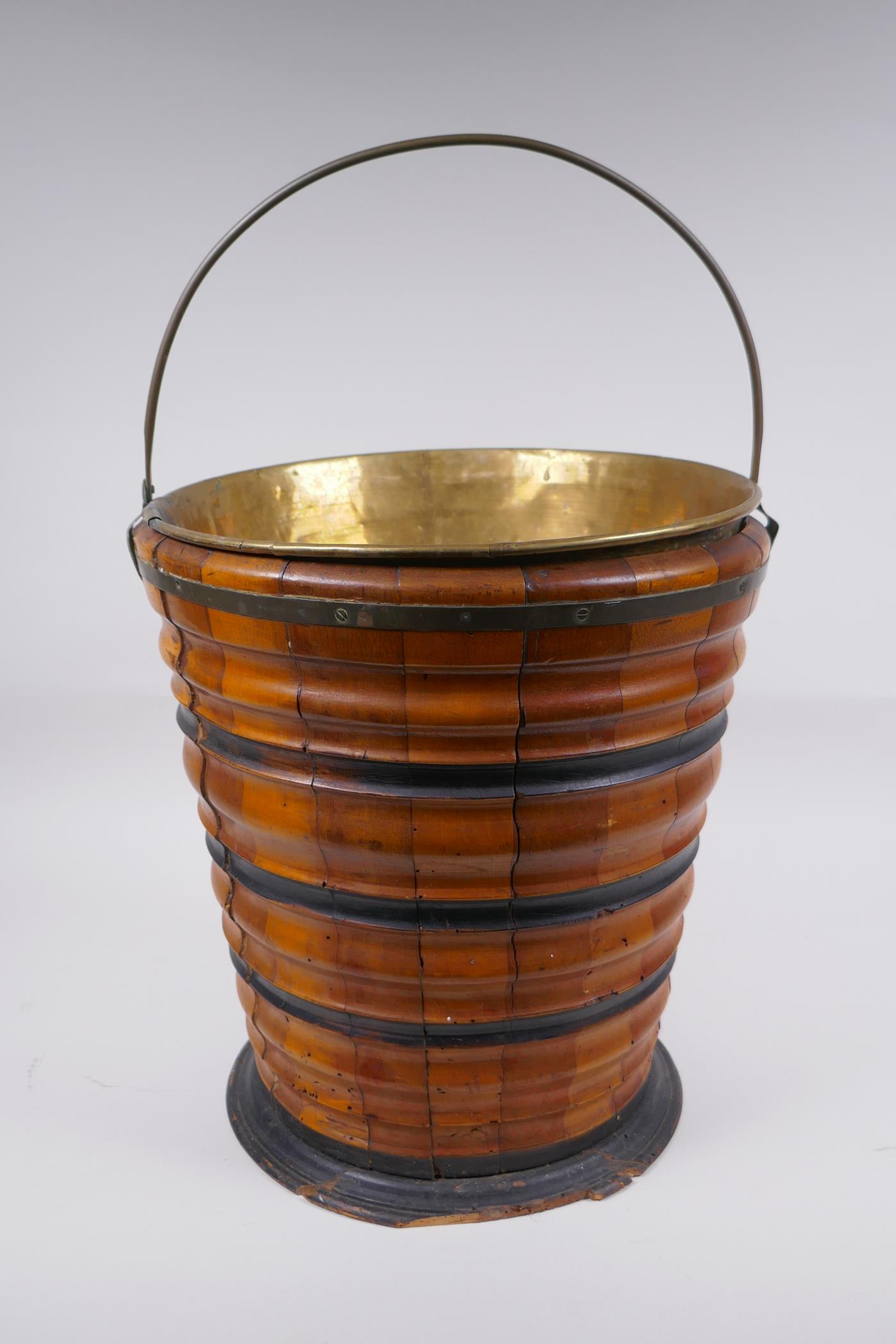 A Dutch coopered fruitwood and brass lined peat bucket with ebonised bands, 32cm high x 29cm - Image 3 of 5