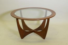 A mid century G-Plan Astro coffee table with inset glass top, 84 dia. x 45 cm high