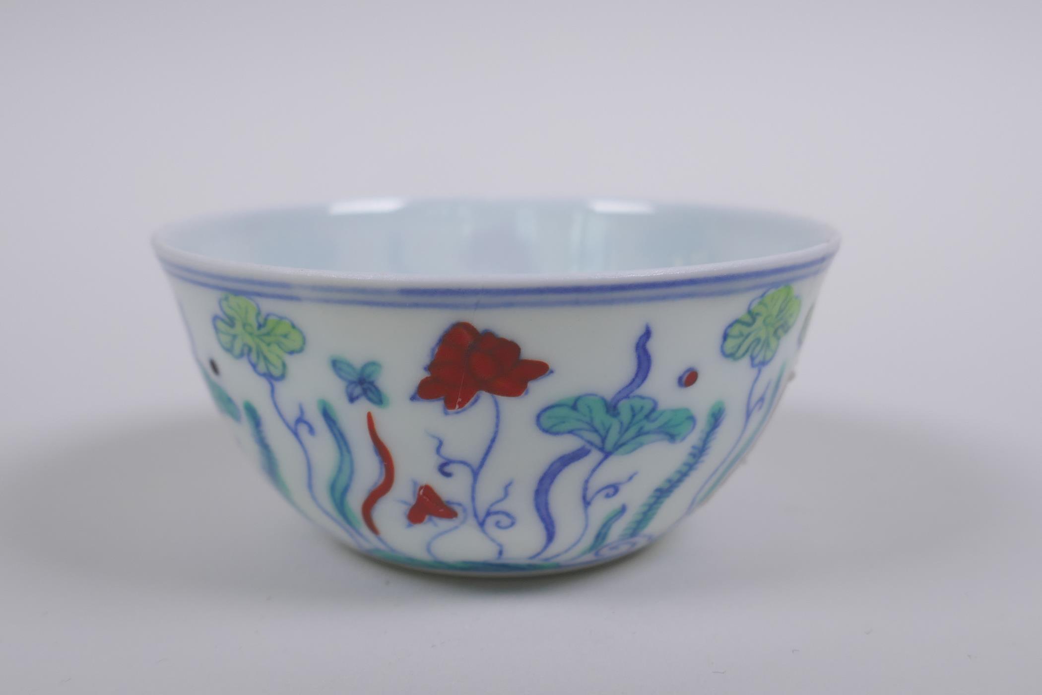 A Doucai porcelain tea bowl with lotus pond decoration, Chinese Chenghua 6 character mark to base, - Image 4 of 7