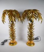 A pair of gilt metal table lamps in the form of palm trees, approximately 72cm high