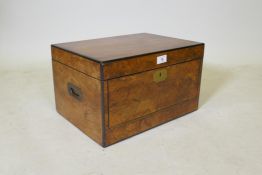 A C19th walnut correspondence box with brass military style handles and mounts, and ebonised