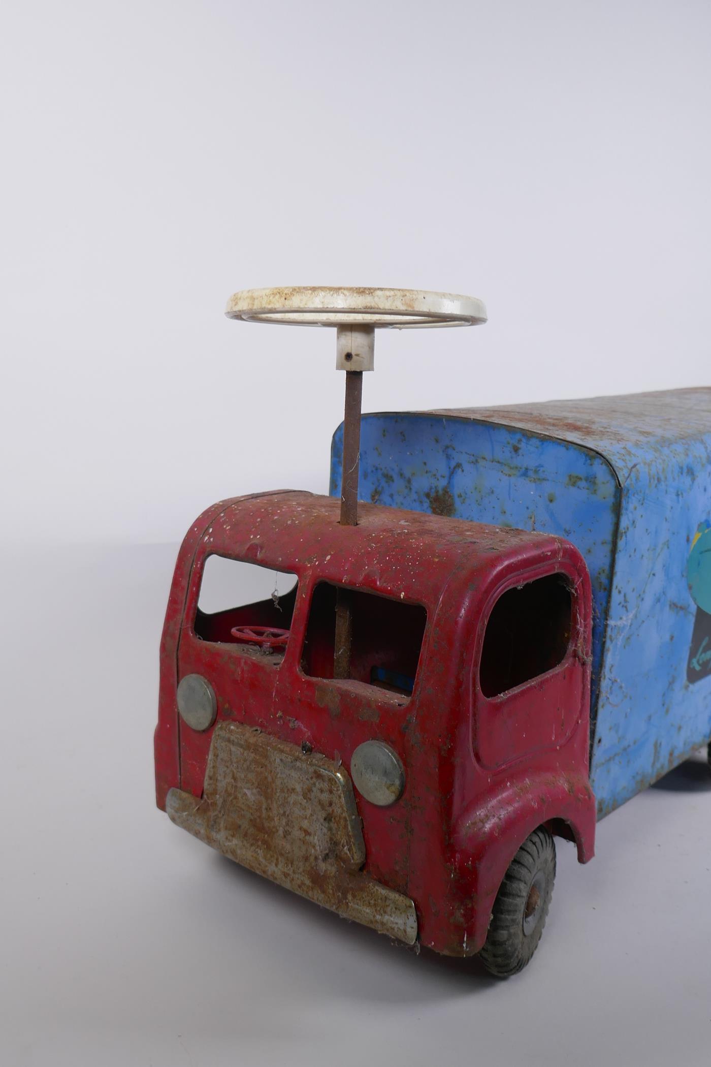 A vintage Triang toys tinplate 'long distance transport' lorry with a sit and steer option, 60cm - Image 2 of 4