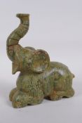 An oriental carved mottled hardstone elephant, 20cm high