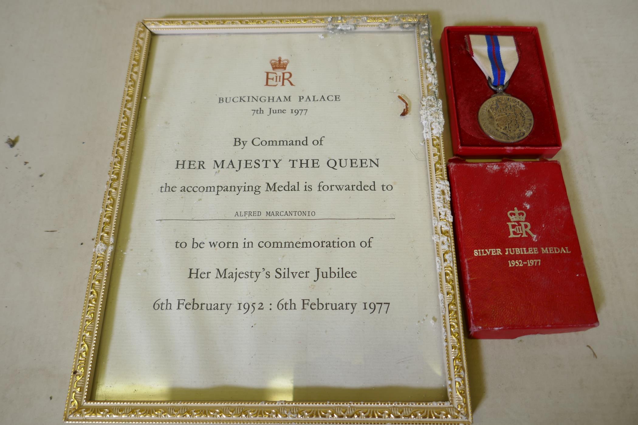An Elizabeth II Silver Jubilee medal with ribbon in original case, with citation