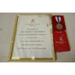 An Elizabeth II Silver Jubilee medal with ribbon in original case, with citation