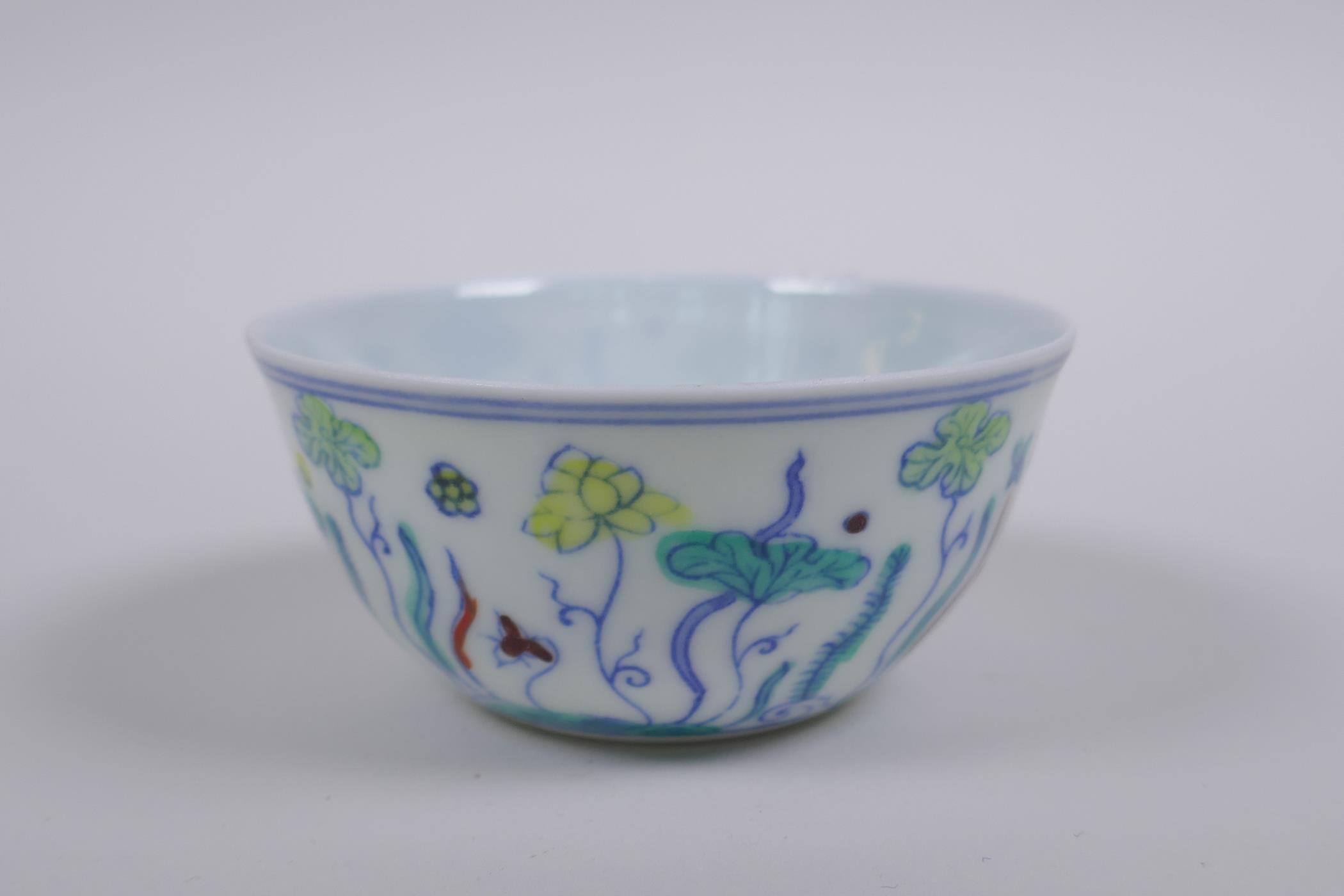 A Doucai porcelain tea bowl with lotus pond decoration, Chinese Chenghua 6 character mark to base, - Image 5 of 7