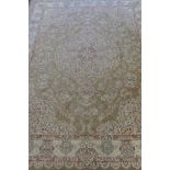 A large fine woven Iranian carpet with bespoke floral design on a buff coloured ground, 300 x 390cm