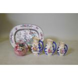 A Victorian ironstone meatplate with Indian tree decoration, three graduated Staffordshire jugs with
