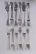 Twelve Georgian silver dessert forks by George Turner, Exeter 1822, total 497g