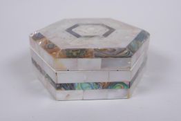 A mother of pearl abalone hexagonal trinket box, 12cm diameter