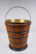 A Dutch coopered fruitwood and brass lined peat bucket with ebonised bands, 32cm high x 29cm