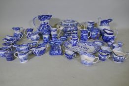 A Mason's blue and white ironstone jug, 28cm high tureen and other blue and white dinner wares,