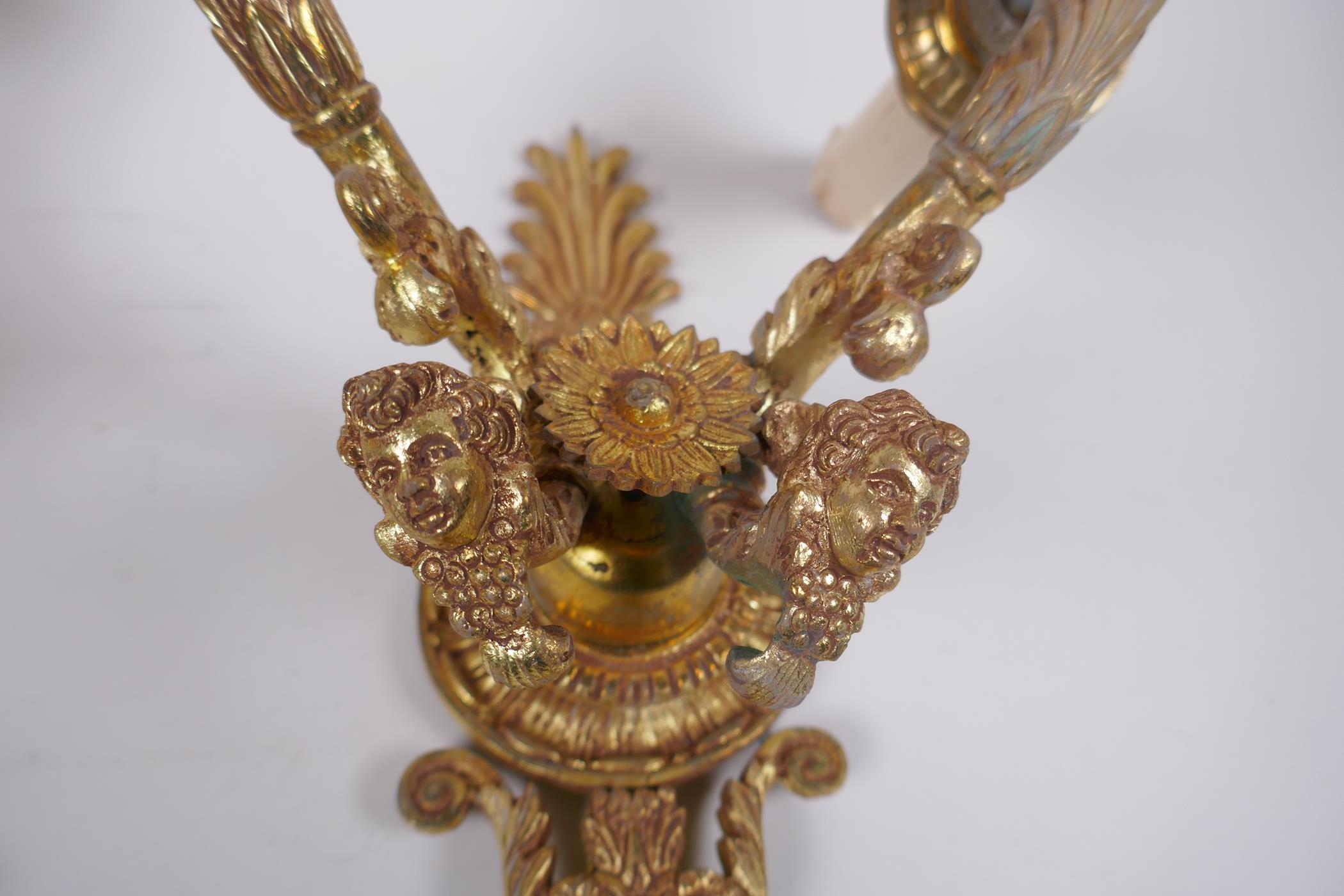 A pair of ormolu two branch wall sconces with putti mask decoration, 30cm high - Image 4 of 4