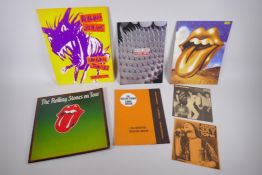 A collection of Rolling Stones ephemera including concert programs, tour books and flyers, largest