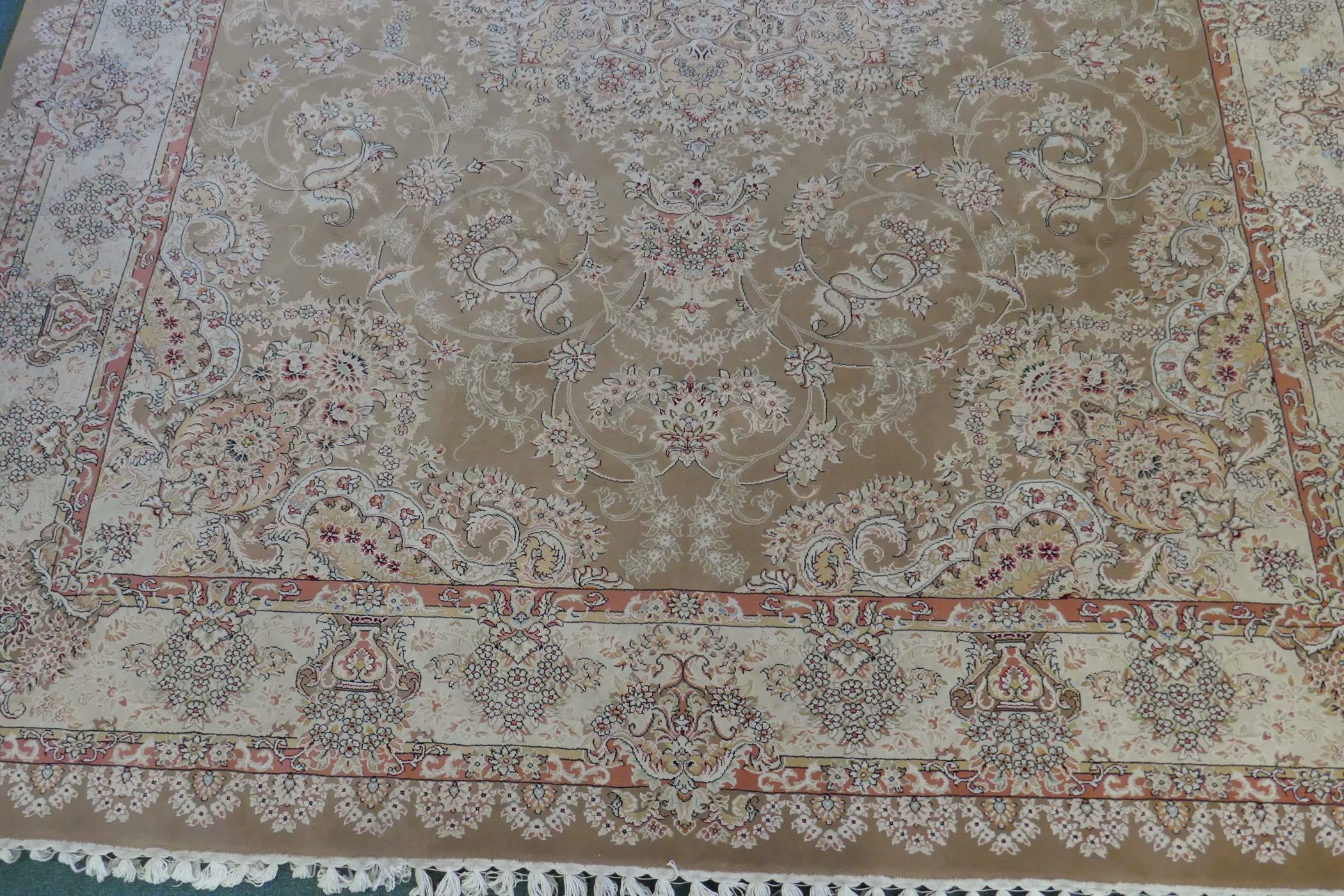 A large fine woven Iranian carpet with bespoke floral design on a buff coloured ground, 300 x 390cm - Image 3 of 6