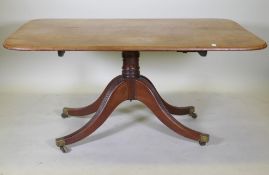 A mahogany breakfast table with an associated top, 95 x 148cm, 73cm high