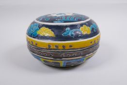 A Chinese fahua porcelain box and cover with lotus flower decoration, 18cm diameter