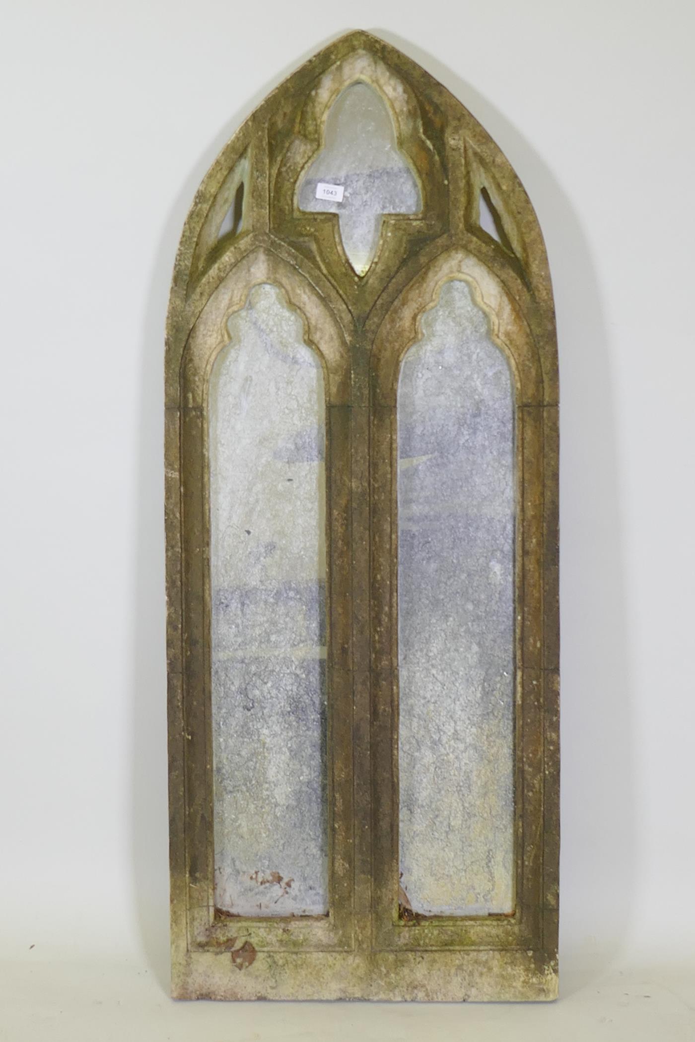 A composition Gothic style garden mirror, 58 x 145cm