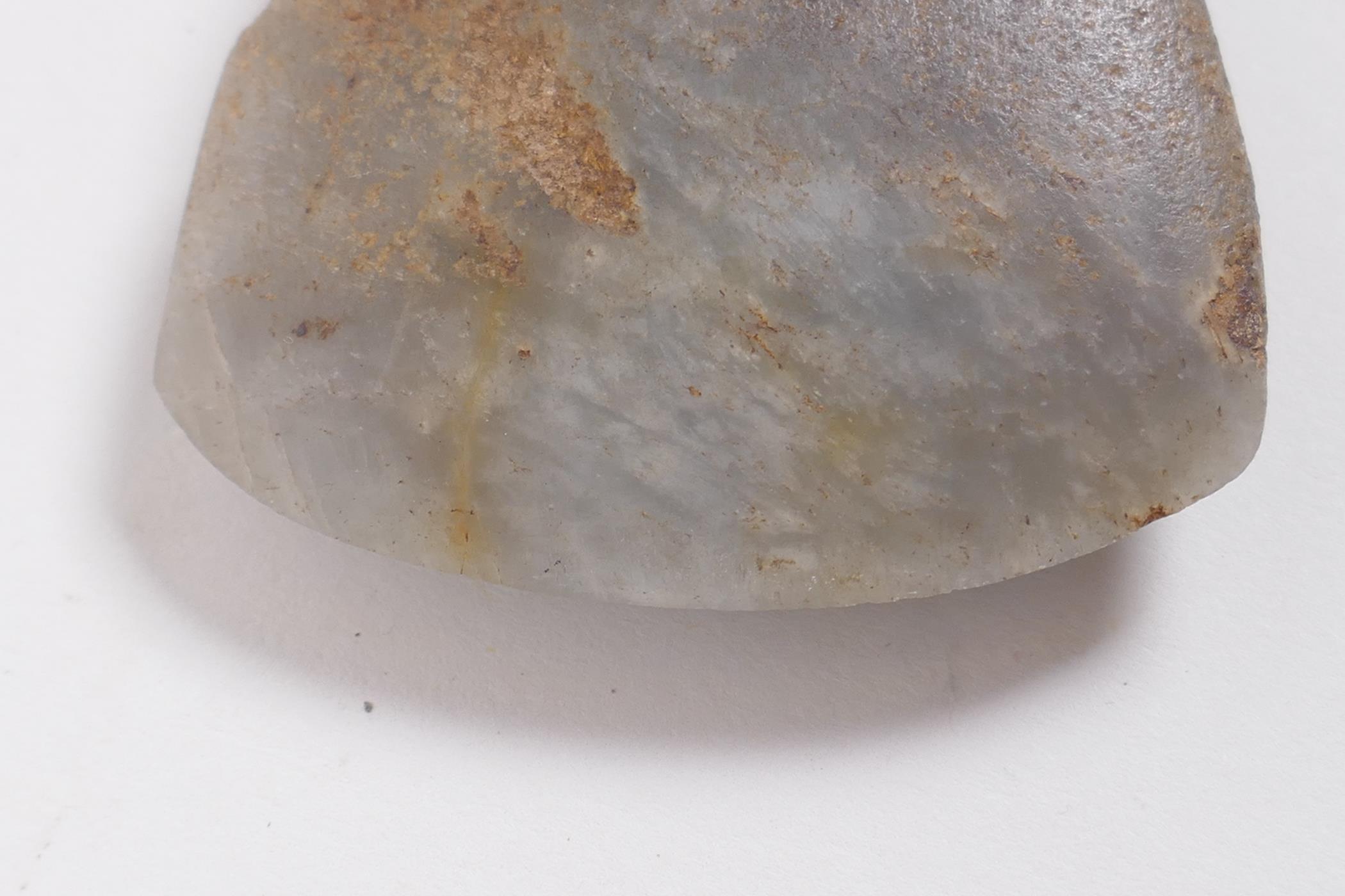 A Neolithic polished hardstone axe head, 8 x 5cm - Image 5 of 5