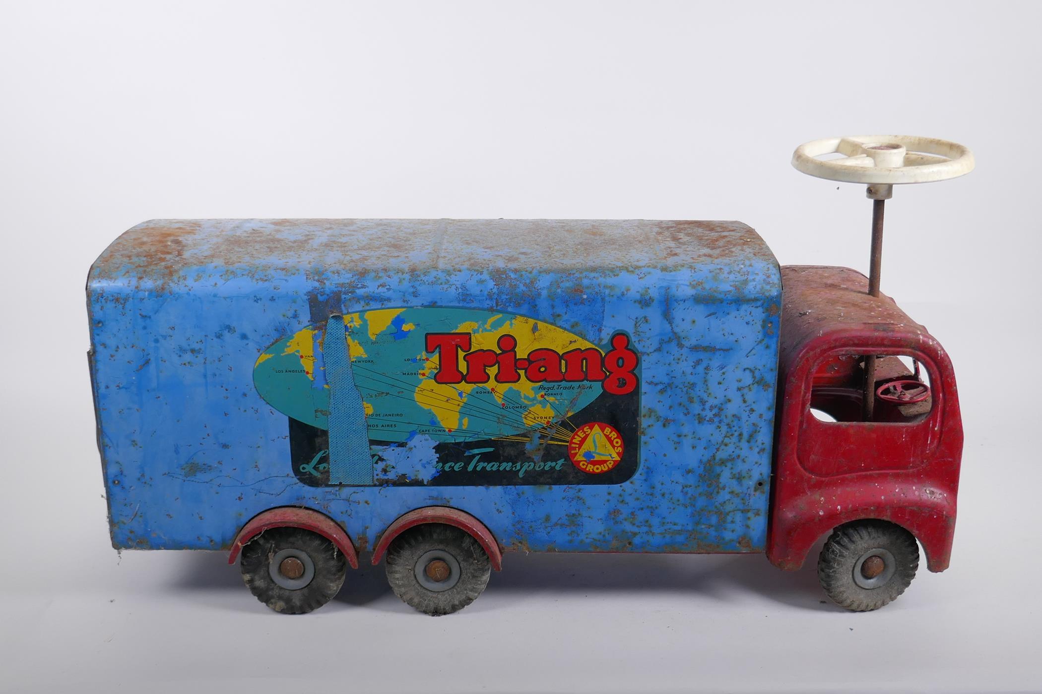 A vintage Triang toys tinplate 'long distance transport' lorry with a sit and steer option, 60cm - Image 4 of 4