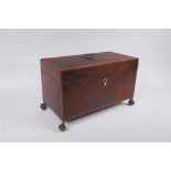 A C19th mahogany tea caddy with banded inlay and brass ball and claw feet, 33 x 18cm 19cm high