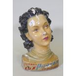 An Italian papier mache and plastic advertising bust, 1930s/40s, 40cm high