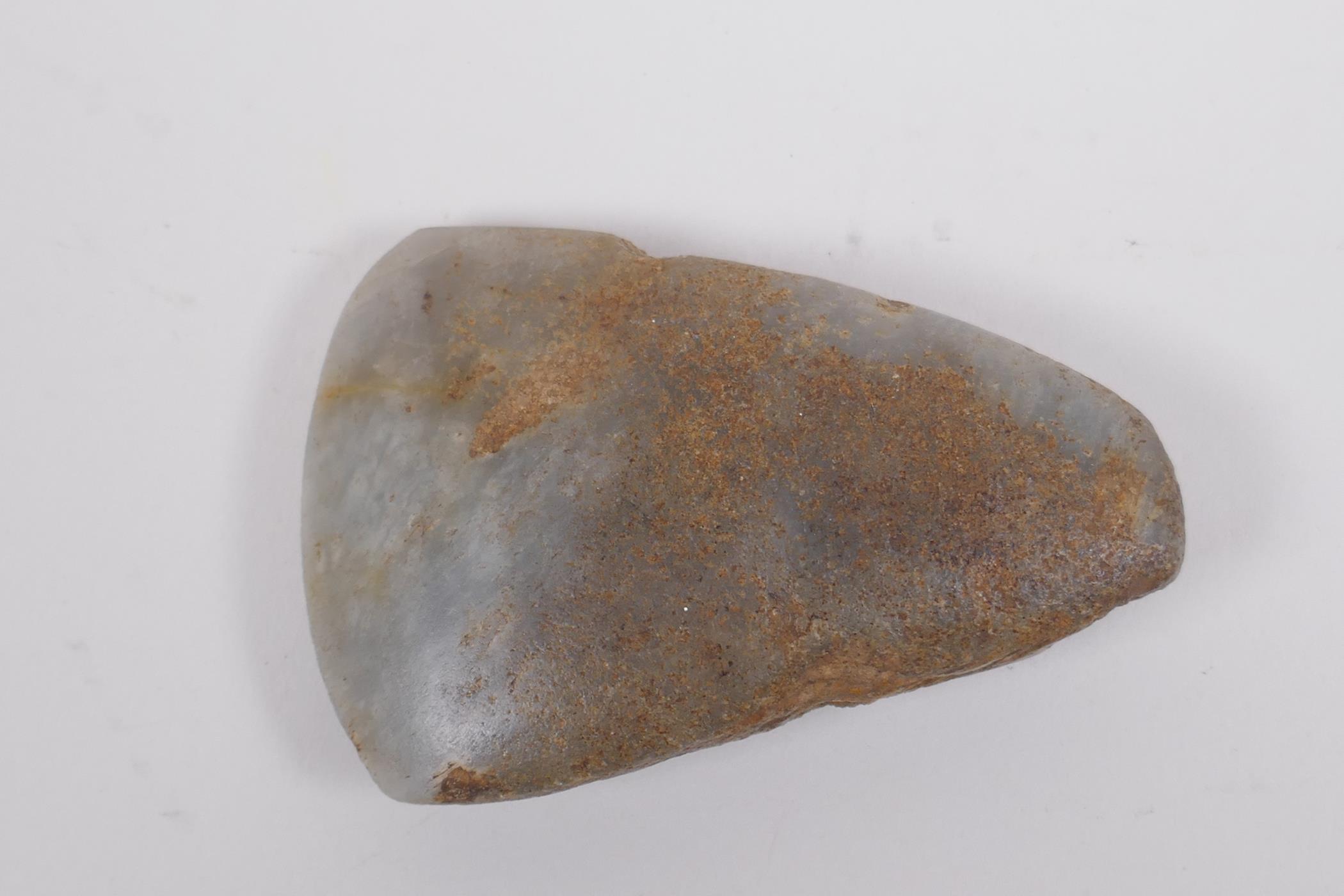 A Neolithic polished hardstone axe head, 8 x 5cm - Image 3 of 5