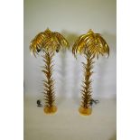 A pair of gilt metal floor lamps in the form of palm trees, approximately 160cm high