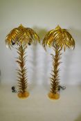 A pair of gilt metal floor lamps in the form of palm trees, approximately 160cm high
