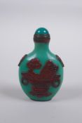 A Peking glass snuff bottle with raised decoration of objects of vitue